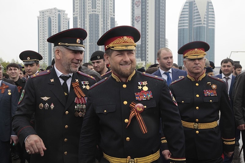 Chechen regional leader Ramzan Kadyrov, center, wearing a Russian military uniform, attends celebrations marking the anniversary of the victory over Nazi Germany. (AP File Photo)