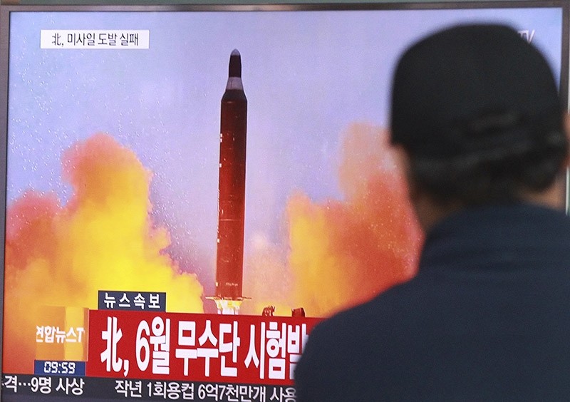 In this Oct. 16, 2016, file photo, a man watches a TV news program showing a file image of a missile launch conducted by North Korea, at the Seoul Railway Station in Seoul, South Korea. (AP Photo)
