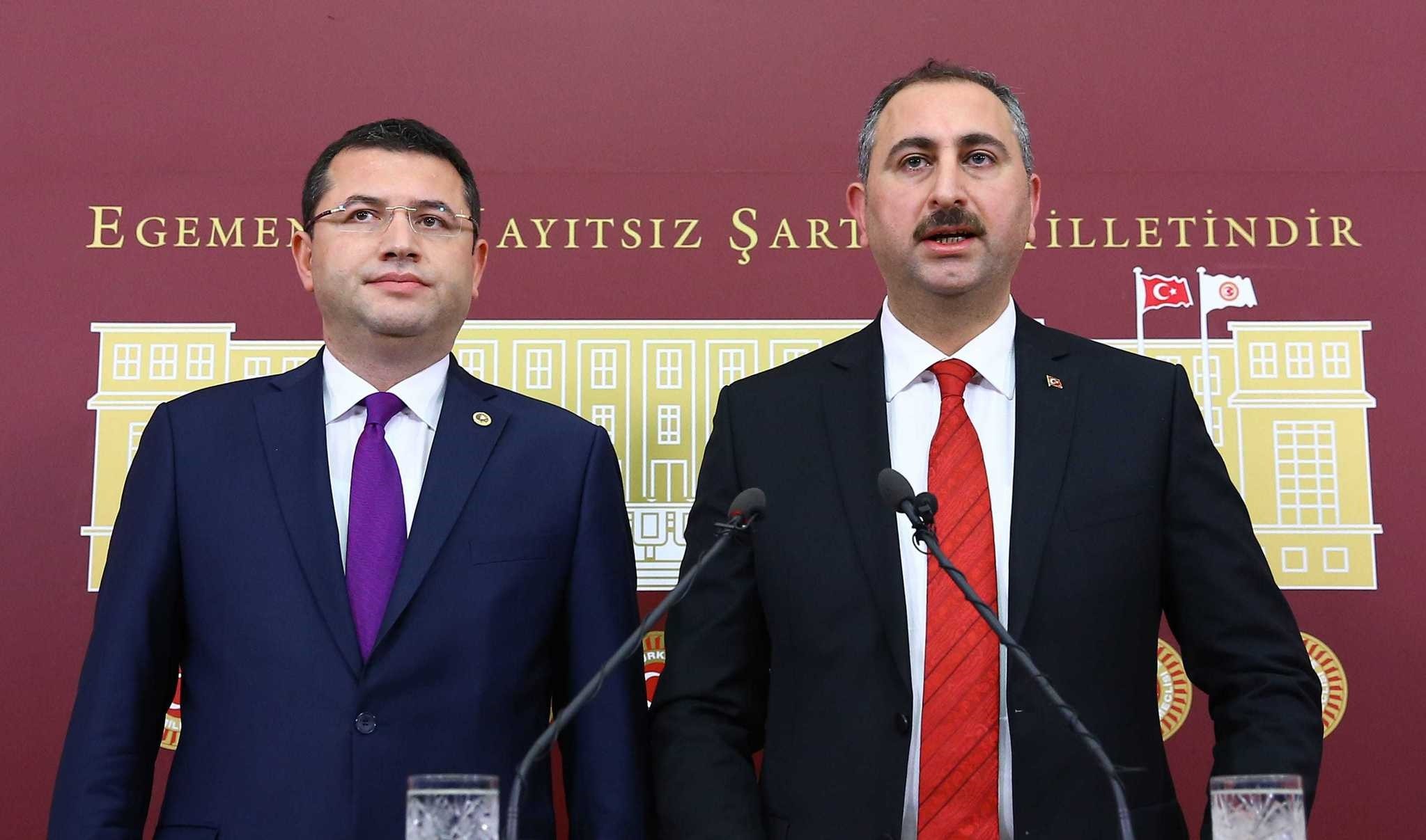 The AK Party General Secretary Abdu00fclhamit Gu00fcl and MHP Deputy Mehmet Parsak, speak at the joint press conferance in Parliament regarding the new constitutional package.