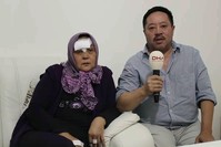u015eeherben Durmaz speaking to the media with her husband Mahmut Durmaz (DHA Photo)