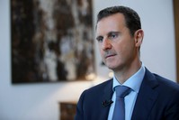 In this Sunday, Oct. 4, 2015 file photo released by the Syrian official news agency SANA, shows Bashar Assad, speaking during an interview with the Iran's Khabar TV, in Damascus, Syria. (AP Photo)
