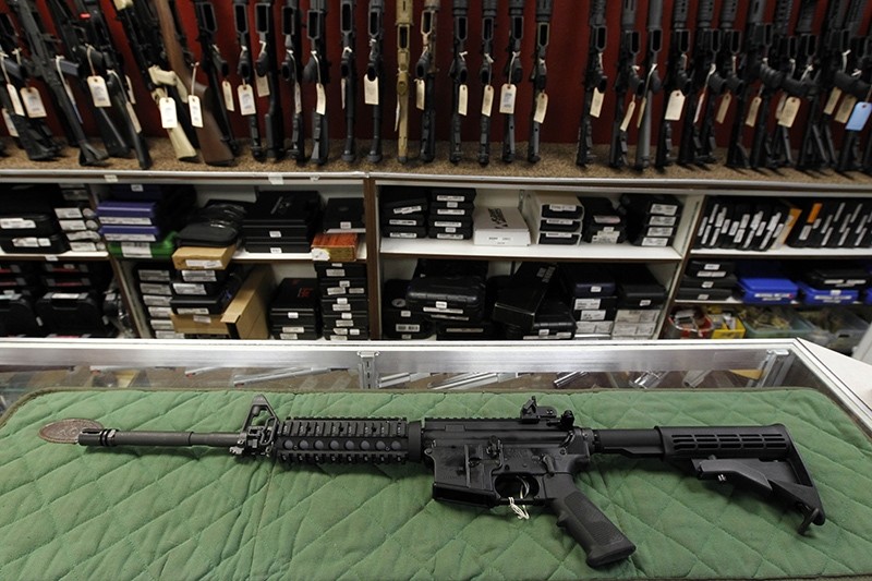  In this July 26, 2012, file photo, an ,AR-15 style, rifle is displayed at the Firing-Line indoor range and gun shop in Aurora, Colo (AP Photo)