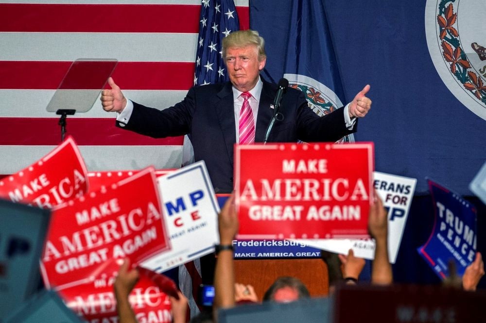 Republican presidential nominee Donald Trump delivers remarks at a campaign rally.