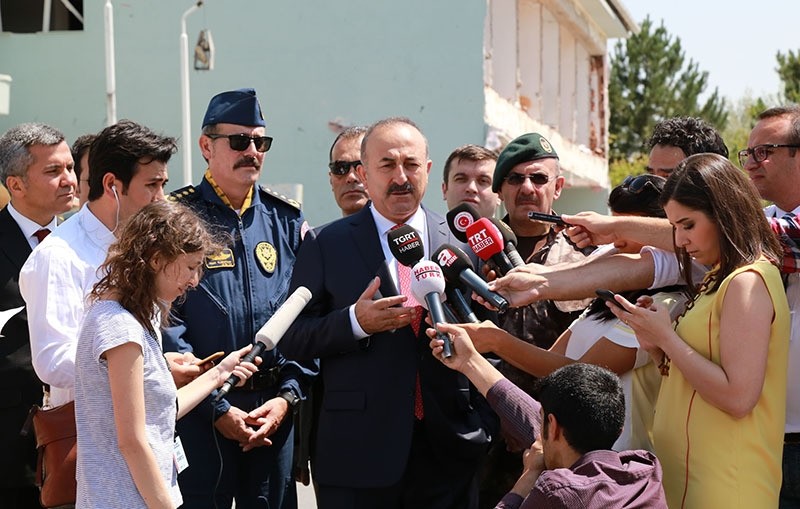 Foreign Minister u00c7avuu015fou011flu speaking to reporters at Special Forces Headquarters in Gu00f6lbau015fu0131, Ankara (IHA Photo)