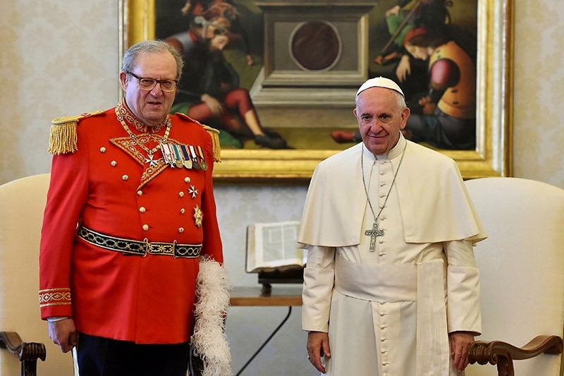 Pope Francis (R) meets Robert Matthew Festing, Prince and Grand Master of the Sovereign Order of Malta during a private audience at the Vatican on June 23, 2016. (Reuters File Photo)