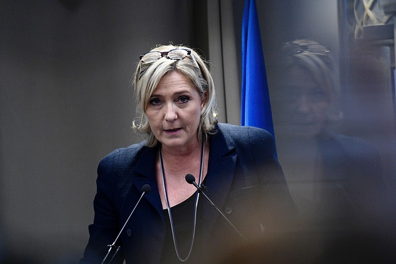 Marine Le Pen delivers a speech during a meeting about healthcare, on December 9, 2016 in Paris.  (AFP PHOTO)