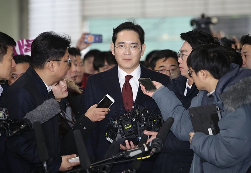 A file picture dated 12 January 2017 shows Lee Jae-yong, Vice Chairman of Samsung (C) arriving to the office of the Independent Counel for questioning in Seoul, South Korea. (EPA Photo)