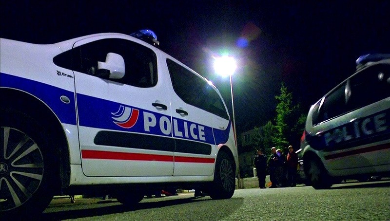 Still image taken from video shows police vehicles at the scene near where a French police commander was stabbed to death in front of his home, June 14, 2016 (Reuters)