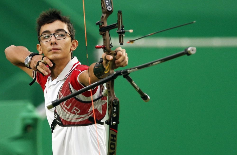 Mete Gazoz of Turkey takes aim during the menu2019s individual round 1/32 eliminations competition of the Rio 2016 Olympic Games Archery events.