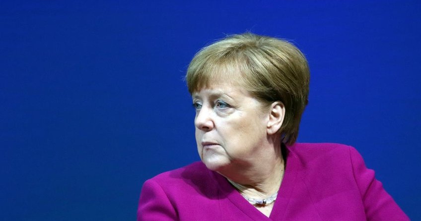 Merkelden Trumpa sert eleştiri
