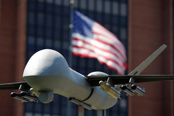 A model of a military drone is seen in front of an U.S. flag as protesters rally against climate change, ahead of the Democratic National Convention, in Philadelphia, Pennsylvania, U.S., July 24, 2016 (Reuters Photo)