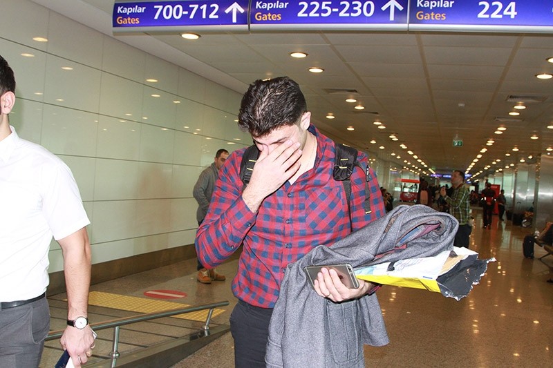 The sorrow of a passenger who was prevented from boarding a US-bound flight is seen in this photo taken Jan. 29, 2017 in Istanbul. (AA Photo)