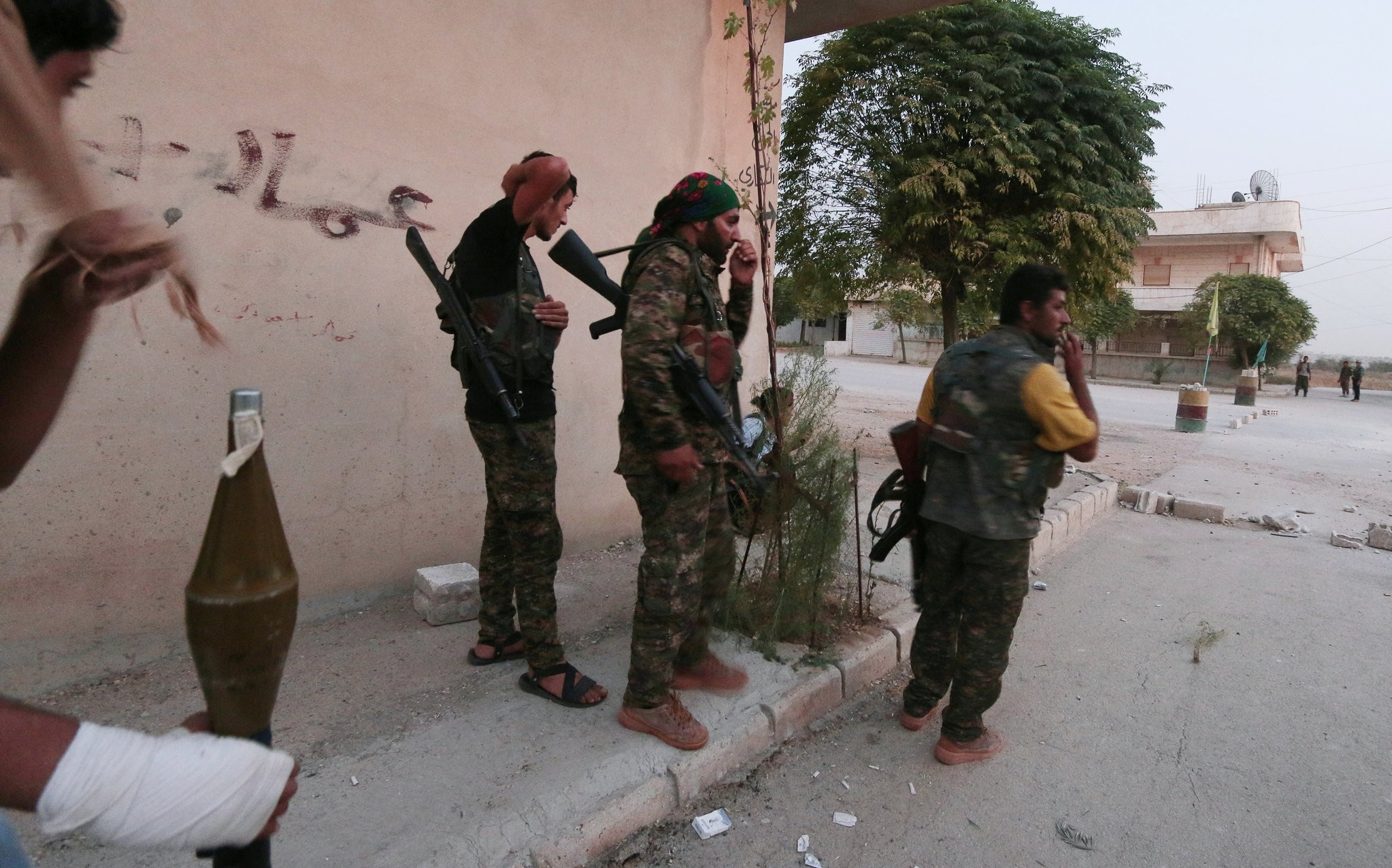 YPG fighters carry their weapons as they take positions in the northeastern city of Hasaka, Syria, August 20, 2016. (Reuters Photo)
