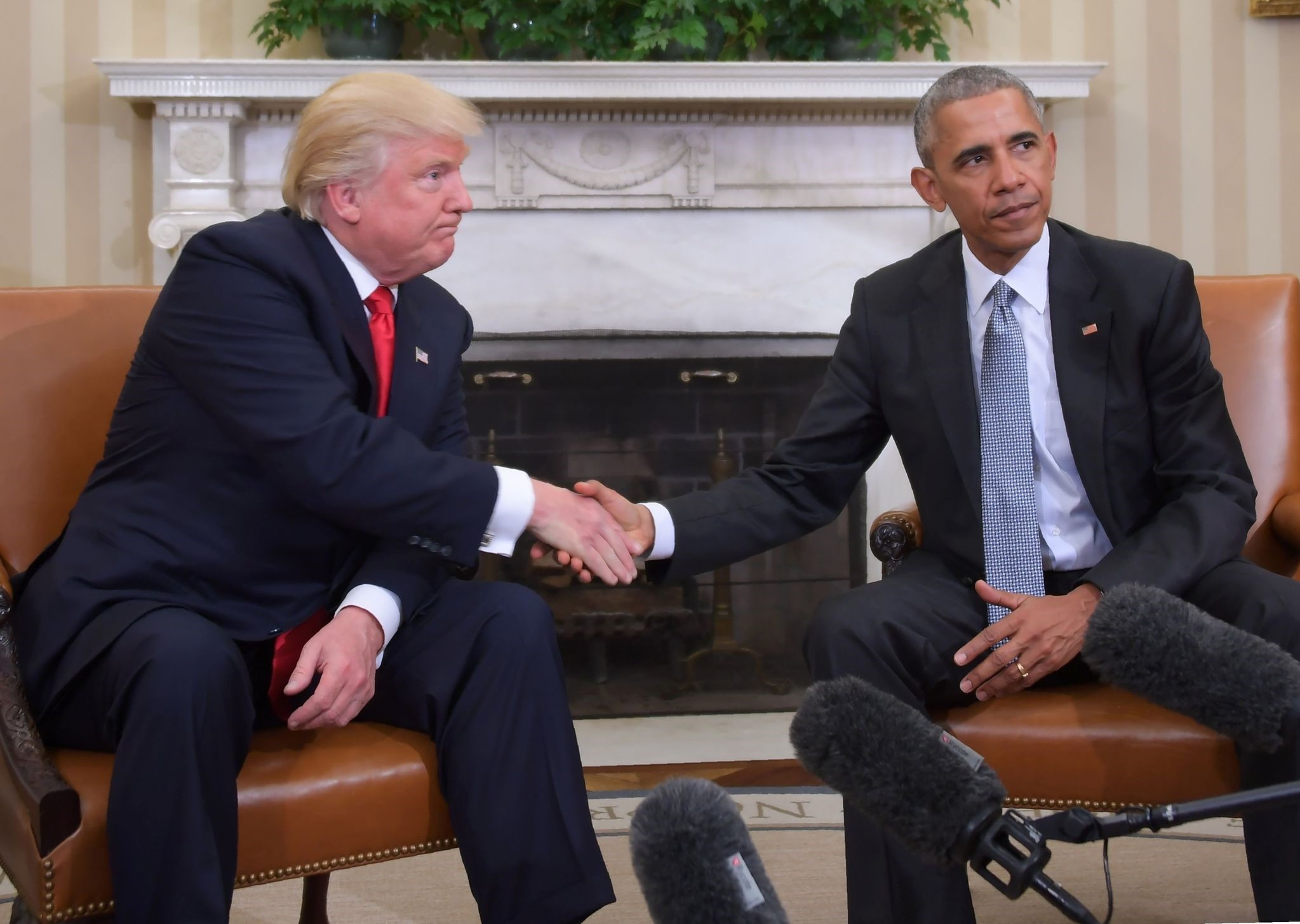This file photo taken on November 10, 2016 shows US President Barack Obama and President-elect Donald Trump shake hands during a transition planning meeting. (AFP Photo) 