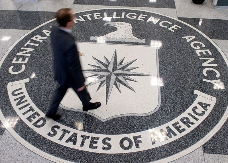 This file photo taken on August 14, 2008 shows a man crossing the Central Intelligence Agency (CIA) logo in the lobby of CIA Headquarters in Langley, Virginia. (AFP Photo)