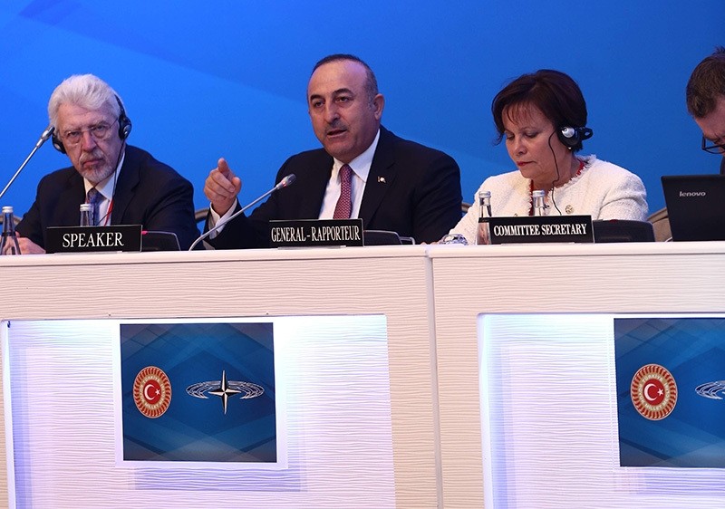 Foreign Minister Mevlu00fct u00c7avuu015fou011flu (center) speaking at the Parliamentary Assembly of NATO meeting in Istanbul, November 19, 2016 (IHA Photo)