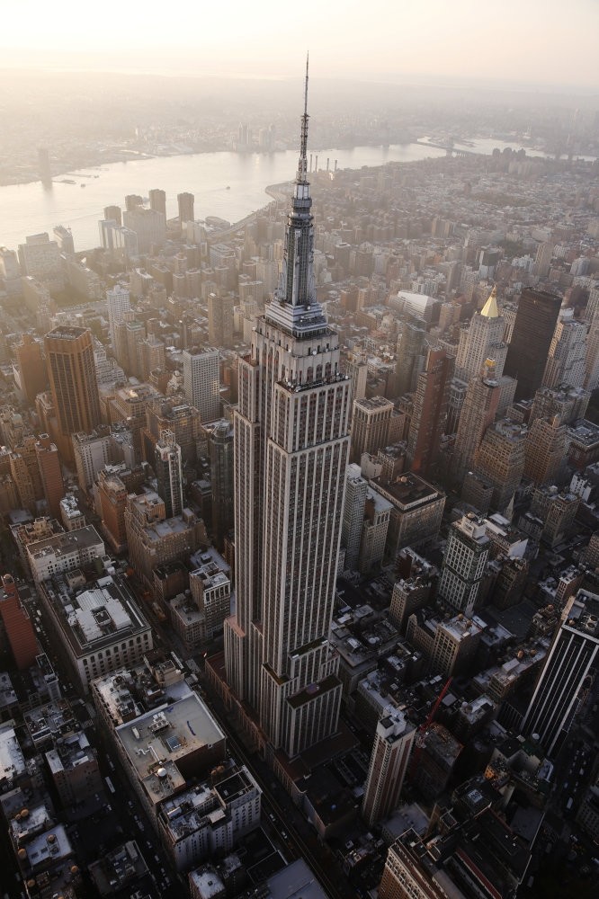The Empire State Building stands over the Manhattan borough of New York.