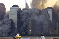 The remaining tower of New York's World Trade Center dissolves in a cloud of dust and debris about a half hour after the first twin tower collapsed. (REUTERS Photo)