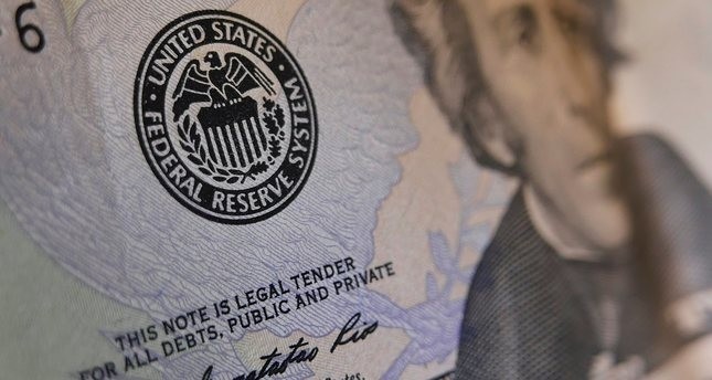 THE SEAL OF THE FEDERAL RESERVE IS SEEN ON A US BANKNOTE ON JUNE 1, 2016 IN WASHINGTON, DC. (AFP Photo)