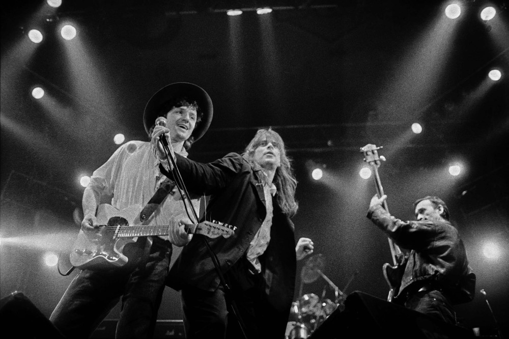 A picture taken on Feb. 2, 1989 shows members of the Yugoslav rock band u201cBijelo Dugmeu201d, Goran Bregovic (L), Alen Islamovic (C) and Zoran Redzic (R), during a concert in Belgrade. 