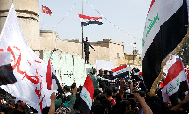 Supporters of Iraqi Shiite cleric Muqtada al-Sadr shout slogans during an anti-Turkey protest in front of the Turkish embassy in Baghdad, Iraq October 18, 2016. (Reuters Photo)