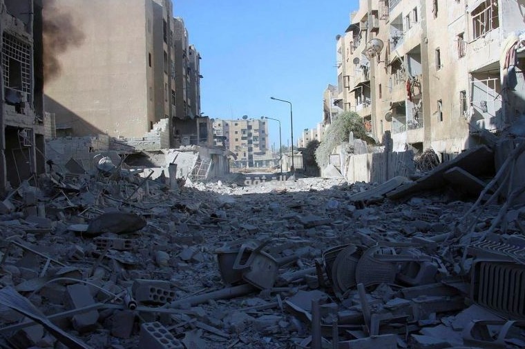 Damaged buildings after airstrikes hit the al-Shaar neighborhood of Aleppo, Syria, Nov. 18.