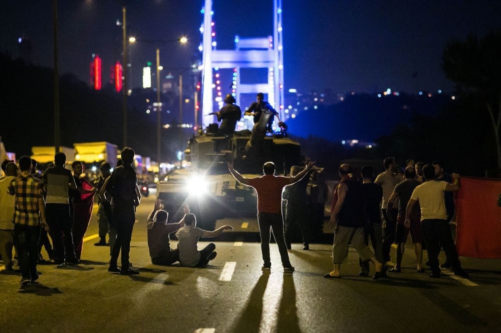 People confront tanks on the coup night near an Istanbul bridge. Strategic locations in the city faced threat of takeover by putschists by strong public resistance helped quelling the coup attempt.
