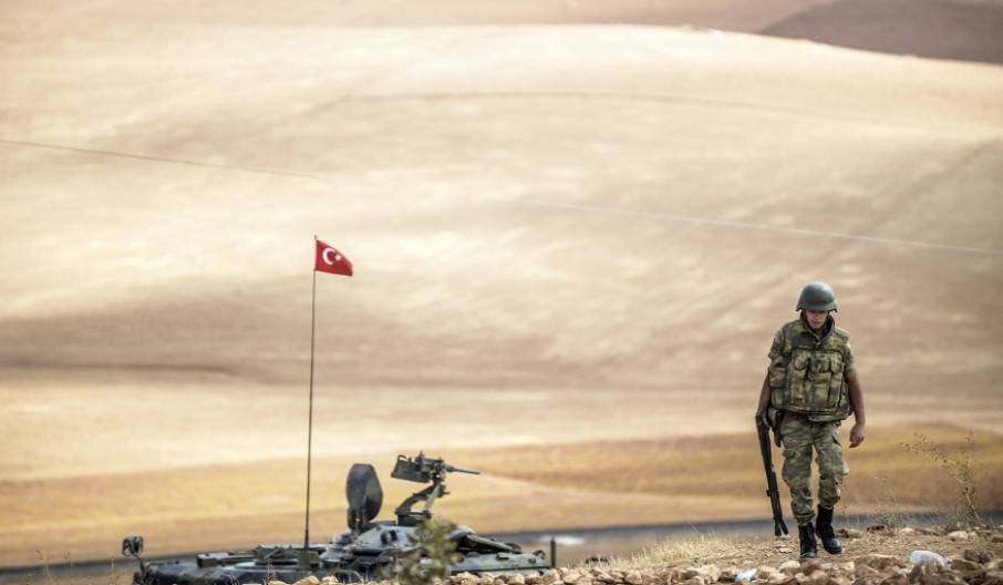 A Turkish soldier patrolling near the Syrian border in the southeastern town of Suruu00e7, u015eanlu0131urfa, on Sept. 30, 2014.
