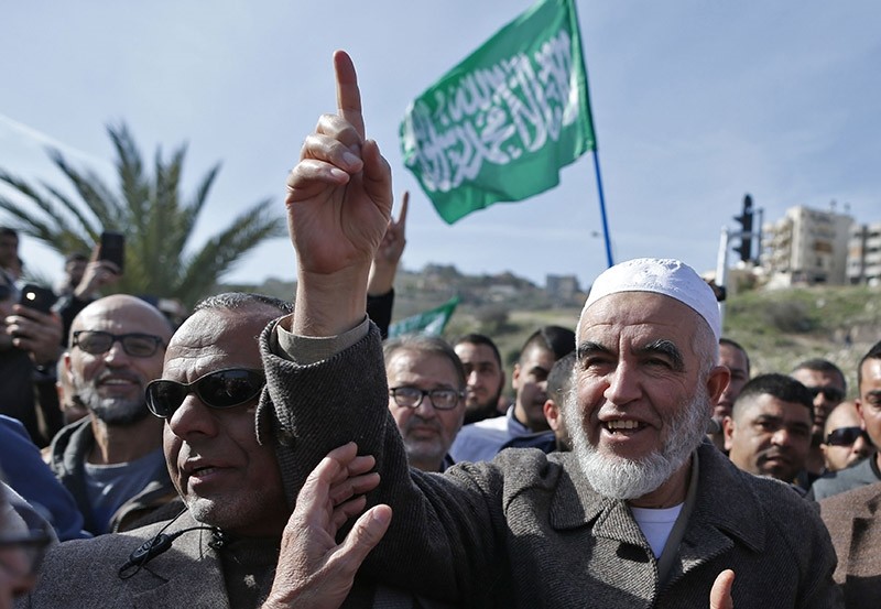 Arab-Israeli Sheikh Raed Salah gestures as he celebrates with supporters in Umm al-Fahm, an Arab-Israeli town 60 kilometers north of Tel Aviv, after he was released from prison on Jan. 17, 2017. (AFP Photo)
