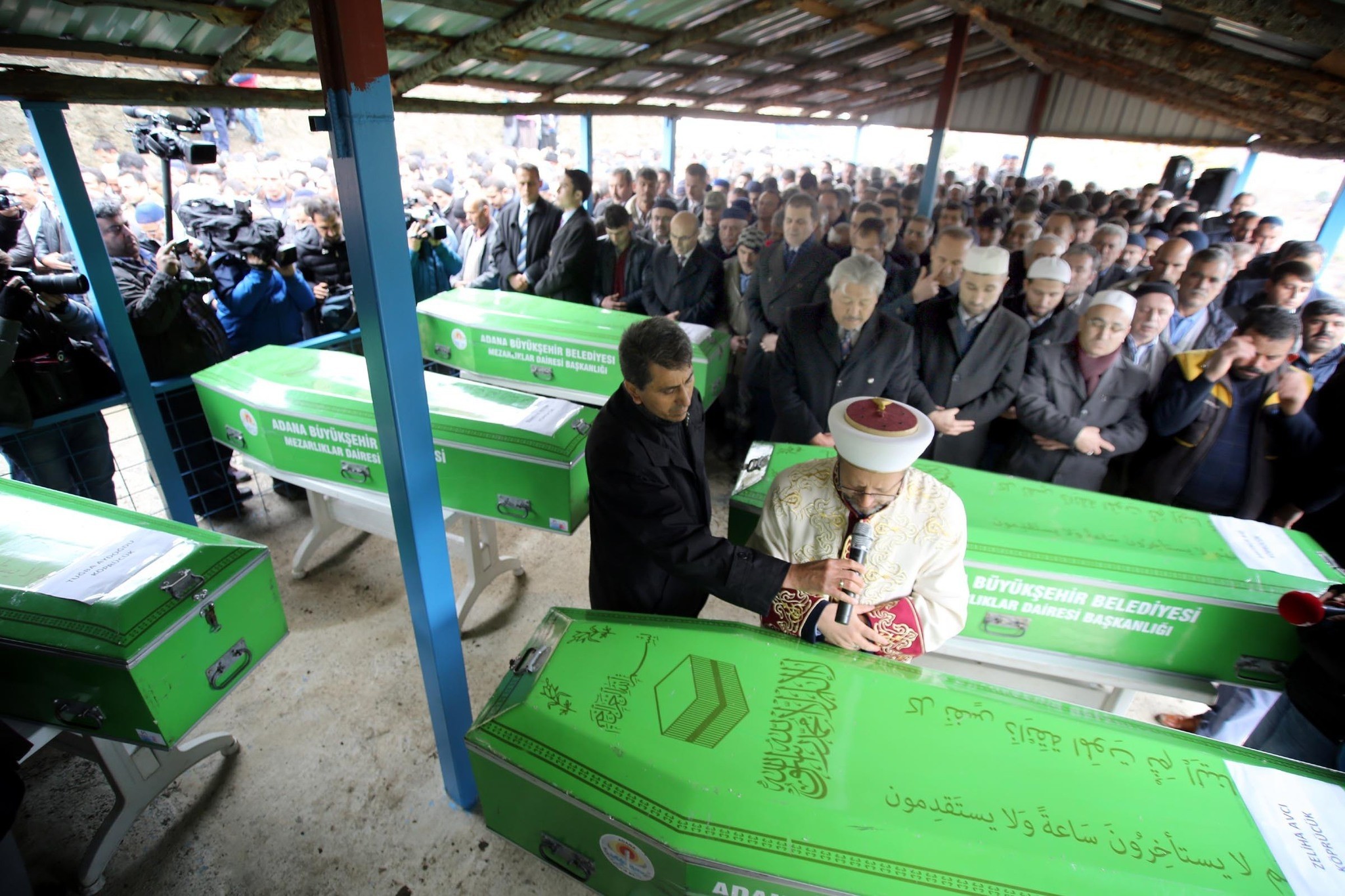 People attend funeral prayers in Adana, on December 1, 2016 for the victims of a fire that killed 11 schoolgirls and an official inside a dormitory. (DHA Photo)
