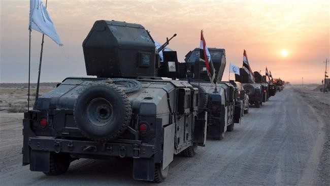 Iraqi military vehicles in eastern Salaheddin province, south of Hawijah, on October 10, 2016.