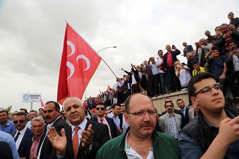 Supporters of dissidents in MHP await in front of police barricade during the emergency convention attempt in Ankara on May 14. (DHA Photo)