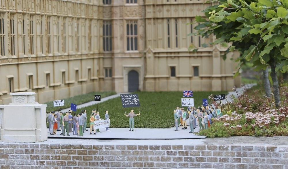 Miniature demonstrators for Brexit are seen in front of a miniature of British Parliament in Mini-Europe miniature park in Brussels. 