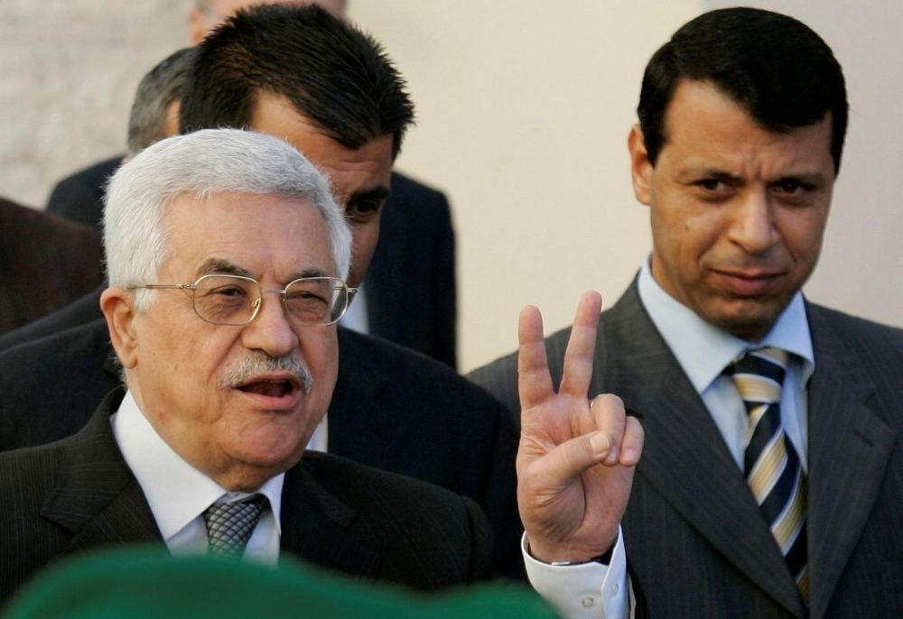 Palestinian Authority President Mahmoud Abbas and Mohammed Dahlan in the West Bank town of Ramallah.