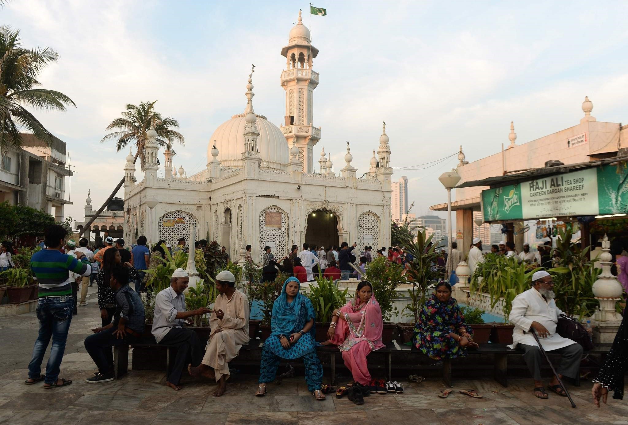 In this photograph taken on December 9, 2015, Indian Muslims and visitors are seen at the Haji Ali Dargah in Mumbai. (AFP Photo)
