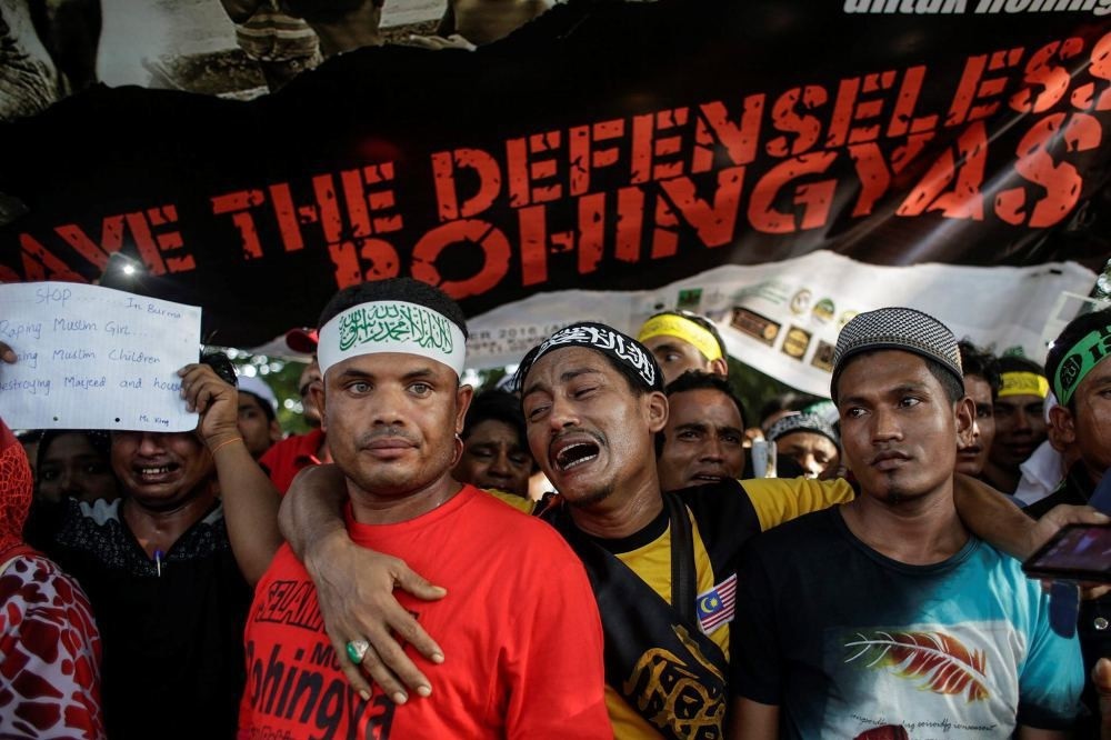 Rohingya Muslims react during a protest condemning Myanmaru2019s government violence on Rohingya people in Rakhine State, in Kuala Lumpur, Malaysia, Dec. 4.