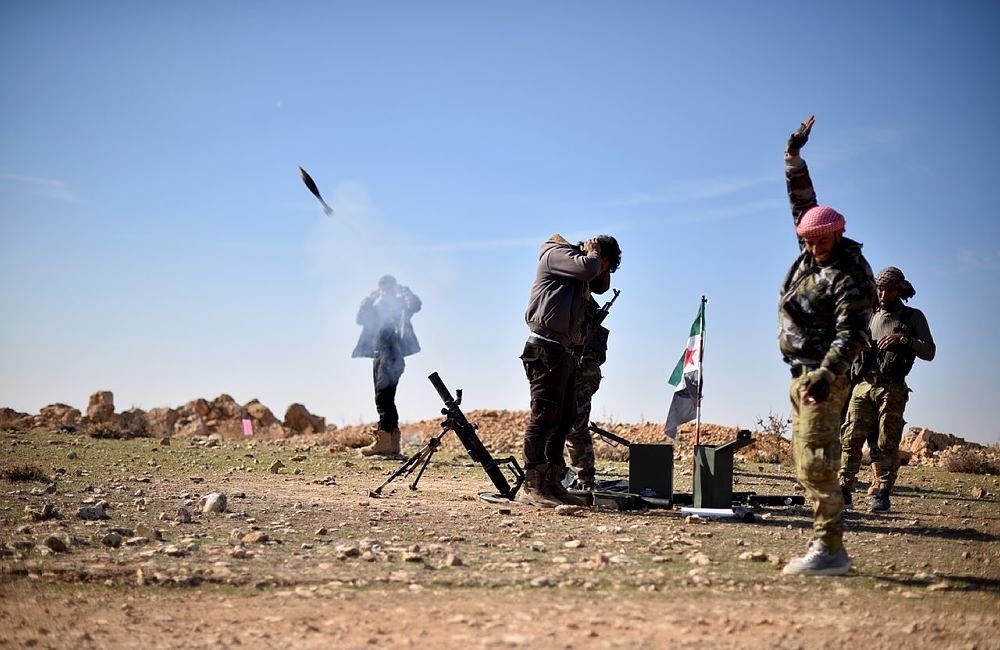 Free Syrian Army fighters during clashes against Daesh terrorists near the Syrian town of Qabasin on Nov. 21.