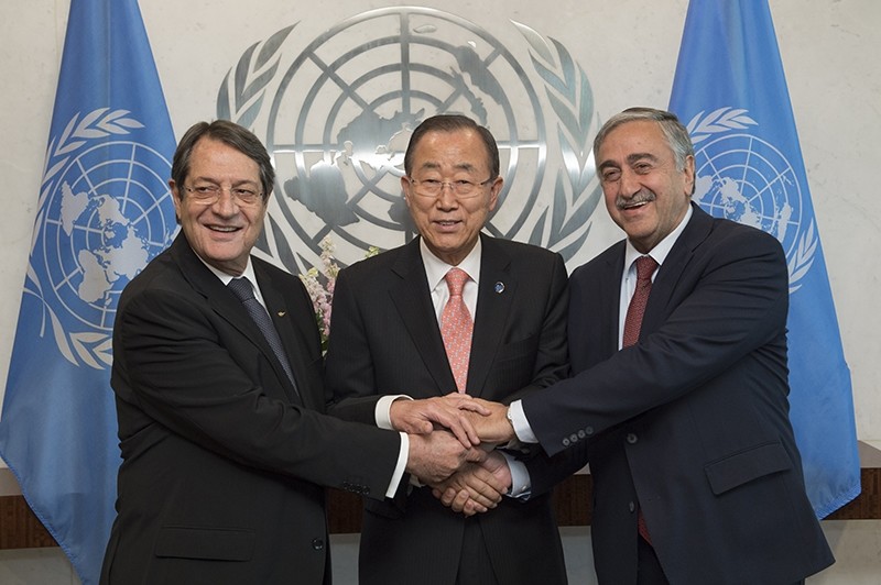 Greek Cypriot leader Nicos Anastasiades and Turkish Cypriot leader Mustafa Aku0131ncu0131 attend a meeting with United Nations Secretary-General Ban Ki-moon at the UN headquarters. (AA Photo)