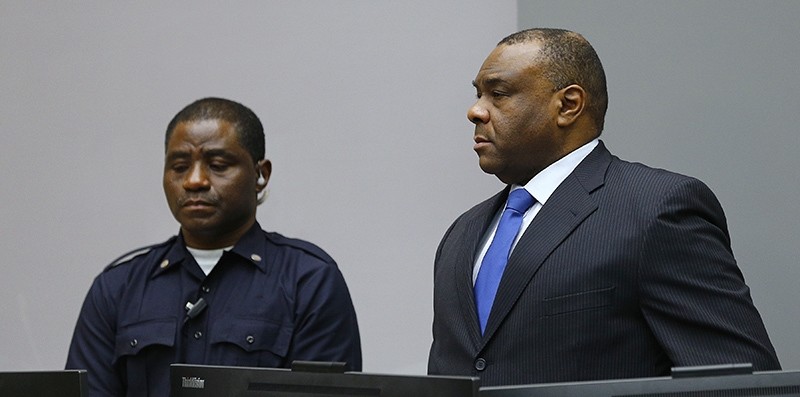 ean-Pierre Bemba takes his seat in the court room of the International Criminal Court in The Hague, Netherlands, Tuesday, June 21, 2016 (AP Photo)