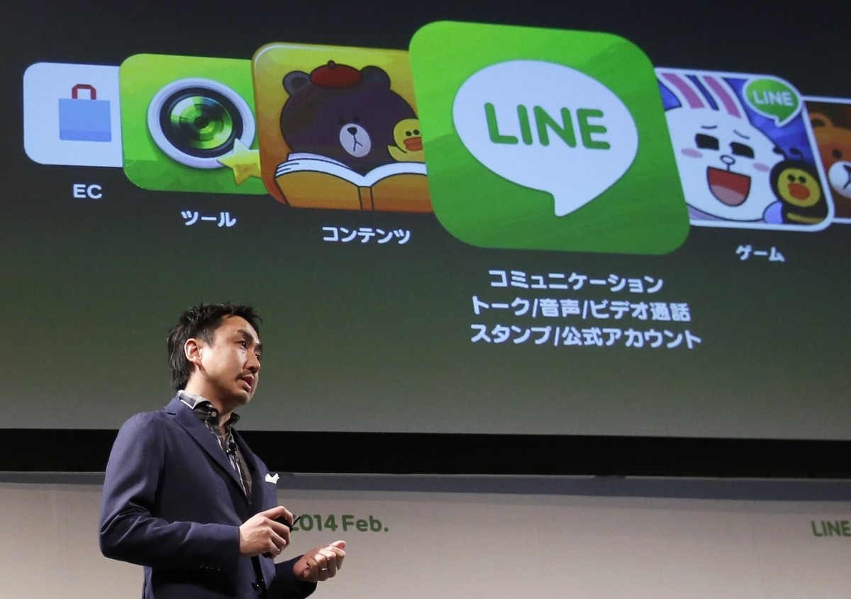 Takeshi Idezawa, chief executive officer of Line Corp, speaks during an announcement of its new service in Tokyo.
