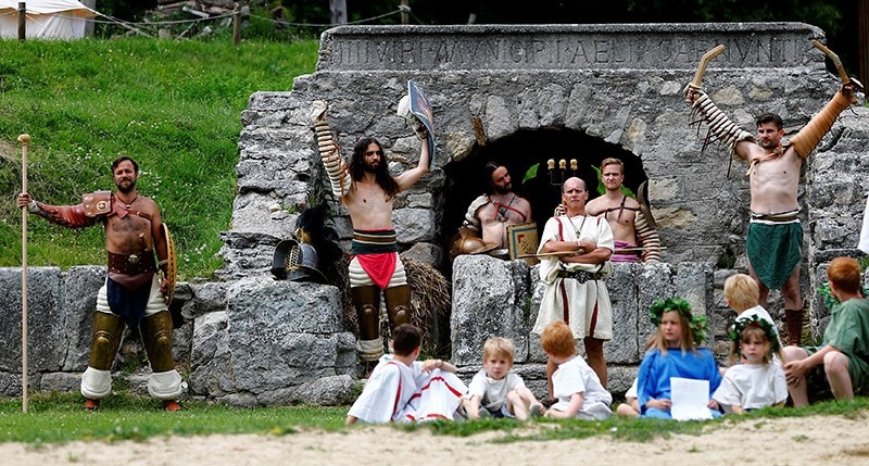 Members of the ,Familia Gladiatoria Carnuntina, arrive for a fight in the historic amphitheatre during the Roman Festival at the archeological site of Carnuntum in Petronell, Austria (Reuters Photo)