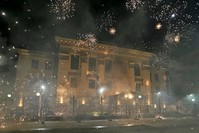 Fireworks launched by protesters, explode near the Russian embassy during the protest against Russian plans to hold parliamentary elections in annexed Crimea, in Kiev, Ukraine, September 17, 2016. (Reuters Photo)