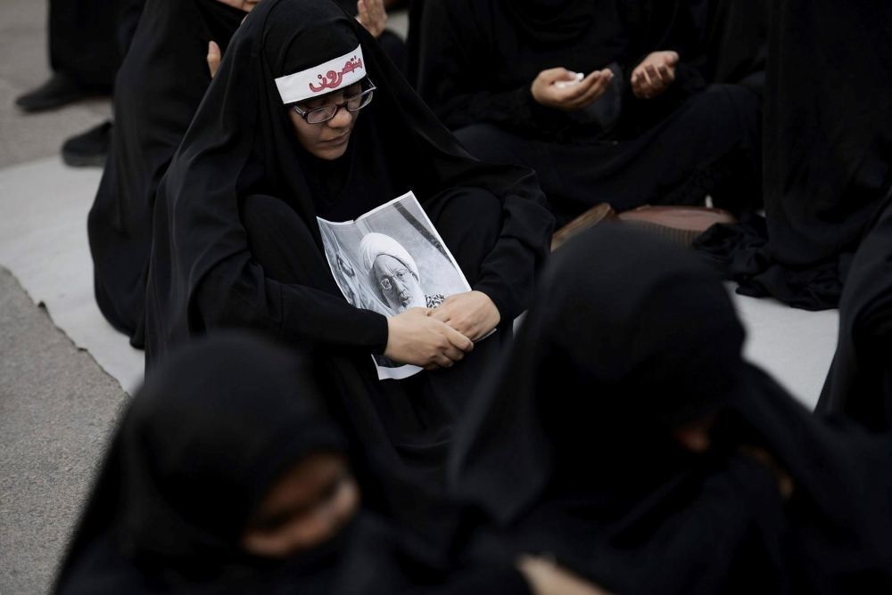 Hardline Bahraini Shiite demonstrators attend a protest against the revocation of the citizenship of a top Bahraini Shiite cleric.