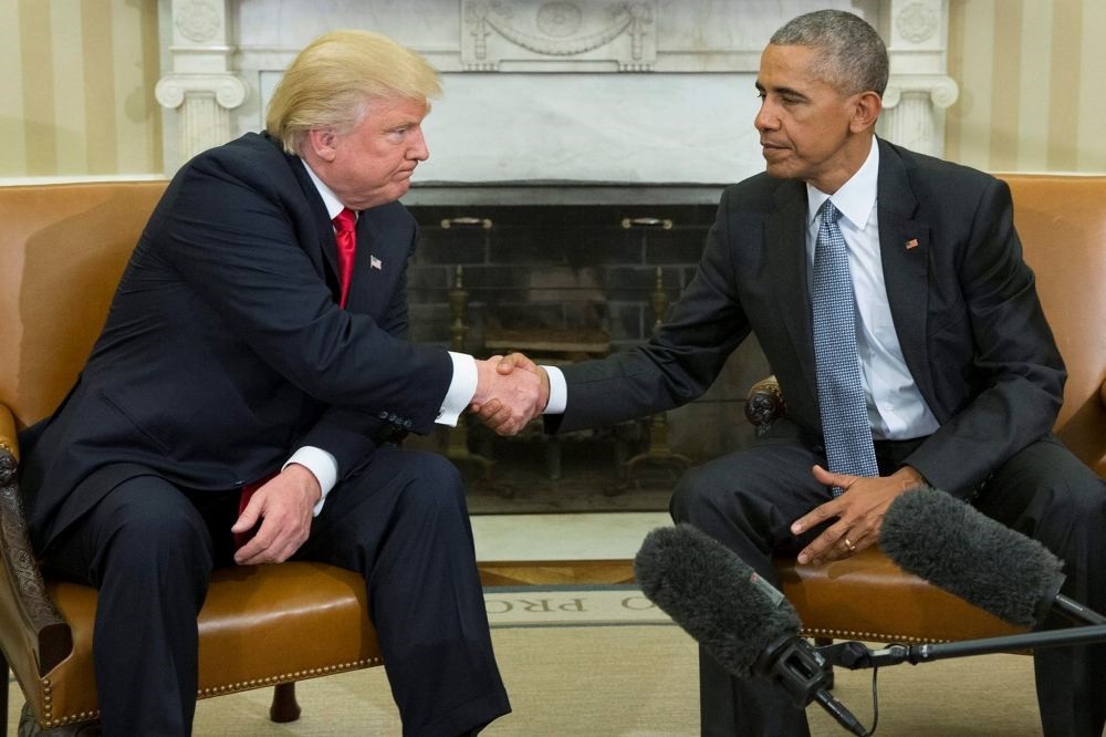 US President Barack Obama shakes hands with President-elect Donald Trump at the end of their meeting in the Oval Office of the White House in Washington.