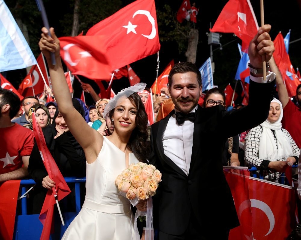 A newlywed couple at a u201cdemocracy watchu201d in Ku0131su0131klu0131, Istanbul.