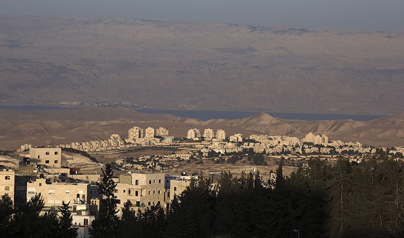 A general view of the Israel Jewish West Bank settlement of Mau2019ale Adumim, seen from Jerusalem, and the dead sea and Jordan in the background, on 06 June 2016 (EPA Photo)