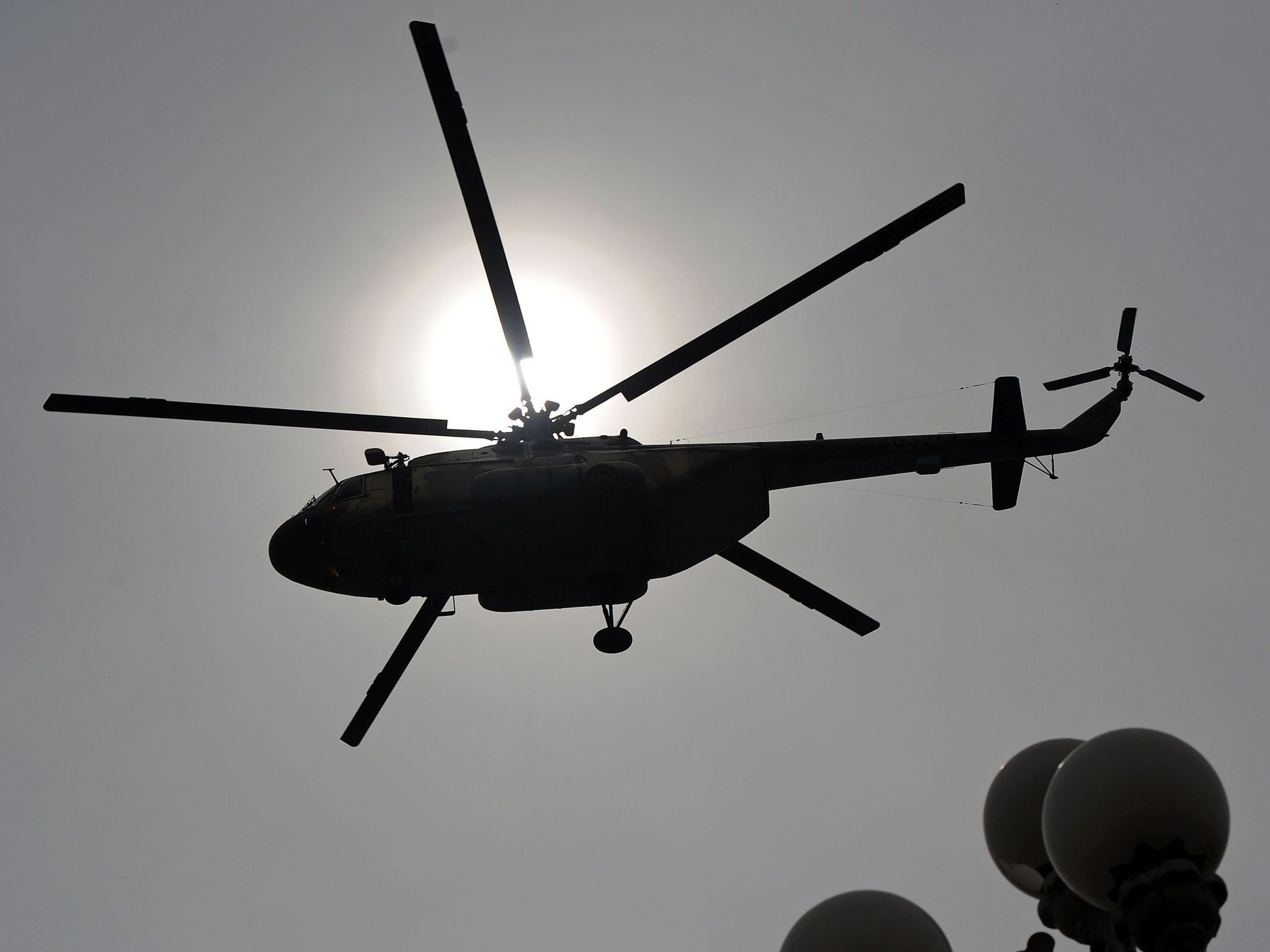 This file photo taken on March 23, 2014 shows a Pakistani Air Force Mi-17 helicopter flies over the Presidential Palace during a parade marking the country's National Day in Islamabad. (AFP Photo)