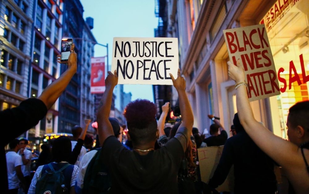 People shout slogans during a protest in support of the Black Lives Matter movement in New York, July 9.