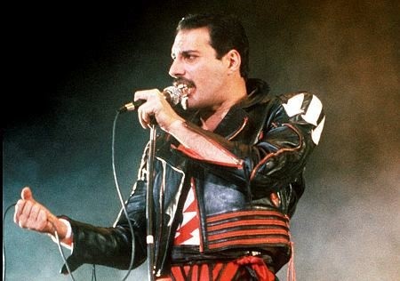 In this 1985 file photo, singer Freddie Mercury of the rock group Queen, performs at a concert in Sydney, Australia. (AP Photo)