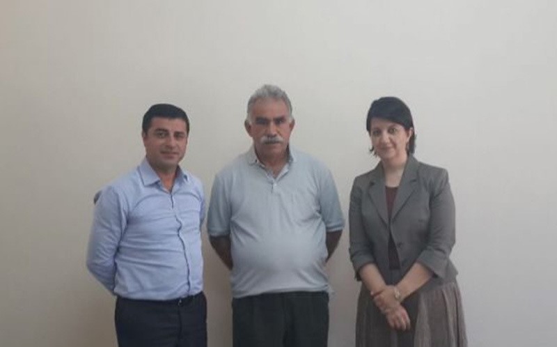 In this file photo, terrorist PKK's imprisoned leader Abdullah u00d6calan (center) is seen beside HDP's co-chair Selahattin Demirtau015f (Left) and Group Deputy Chair Pervin Buldan (Right) at u0130mralu0131 Prison (Sabah Photo)